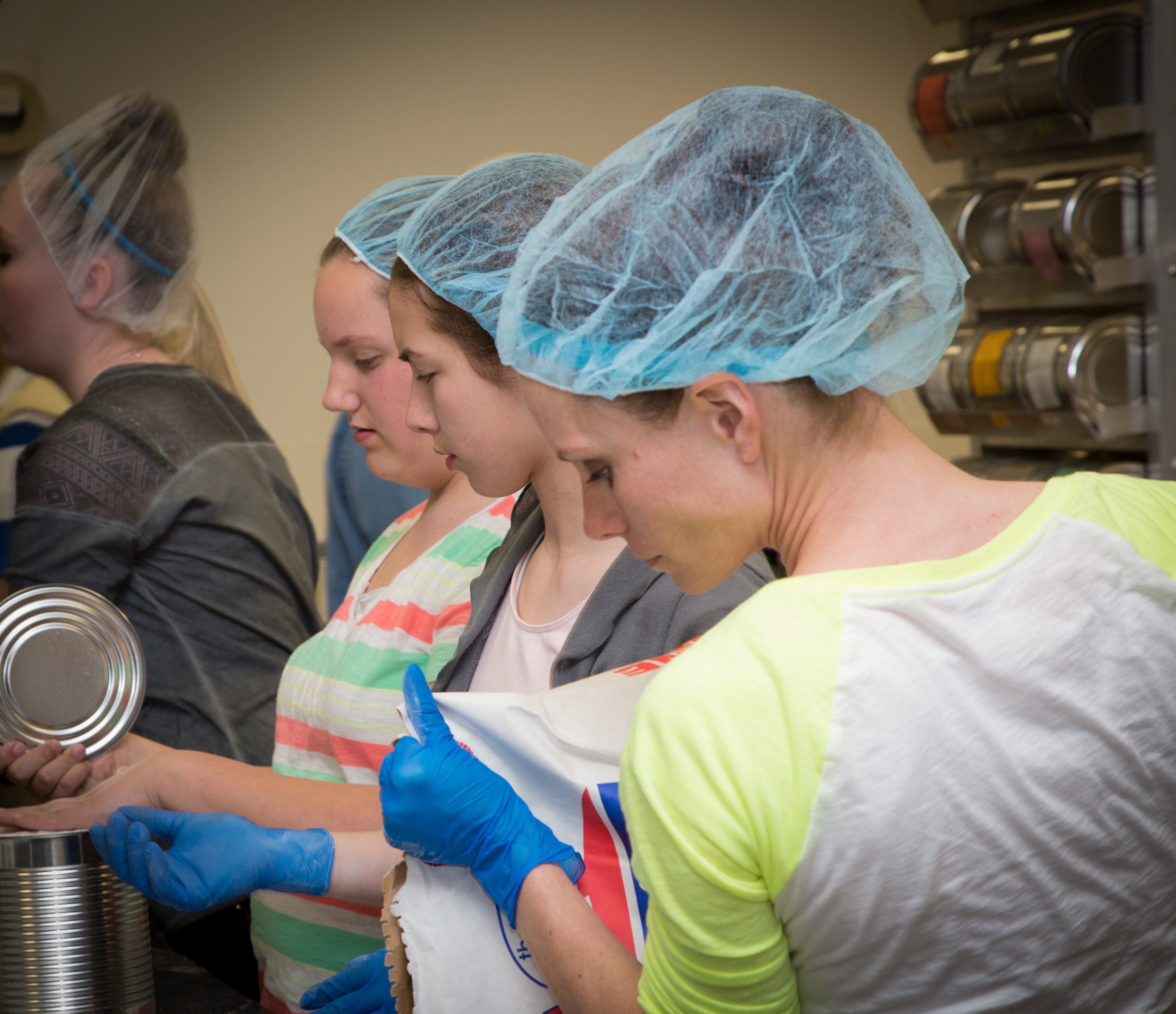 Girls Volunteering Cannery